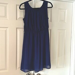 Royal blue chiffon dress with pleated front and gathered waist.